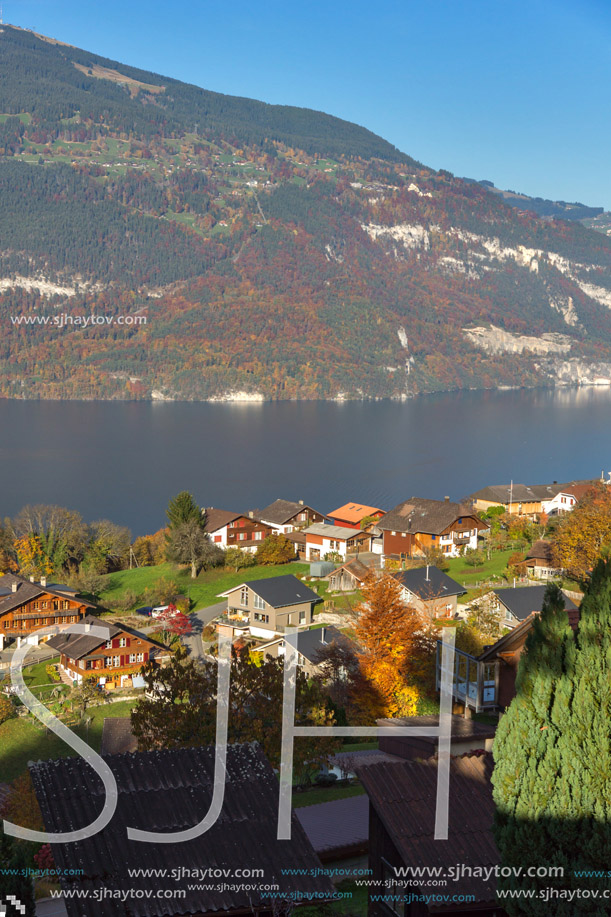 Amazing view of Lake Thun and typical Swiss village, Canton of Bern, Switzerland