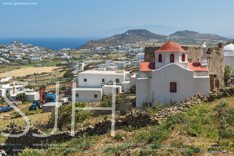 White church and medieval fortress , Mykonos island, Cyclades, Greece