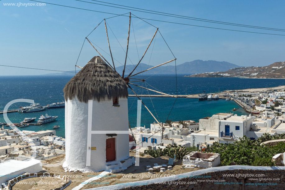 Panorama with white windmill and island of Mykonos, Cyclades, Greece