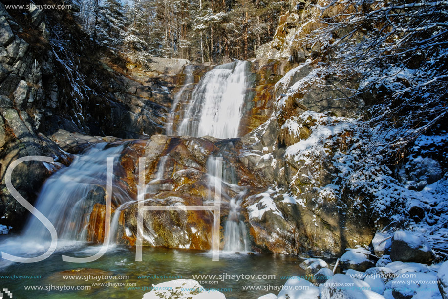 Winter view of Popina Luka waterfall near town of Sandanski, Pirin Mountain, Bulgaria