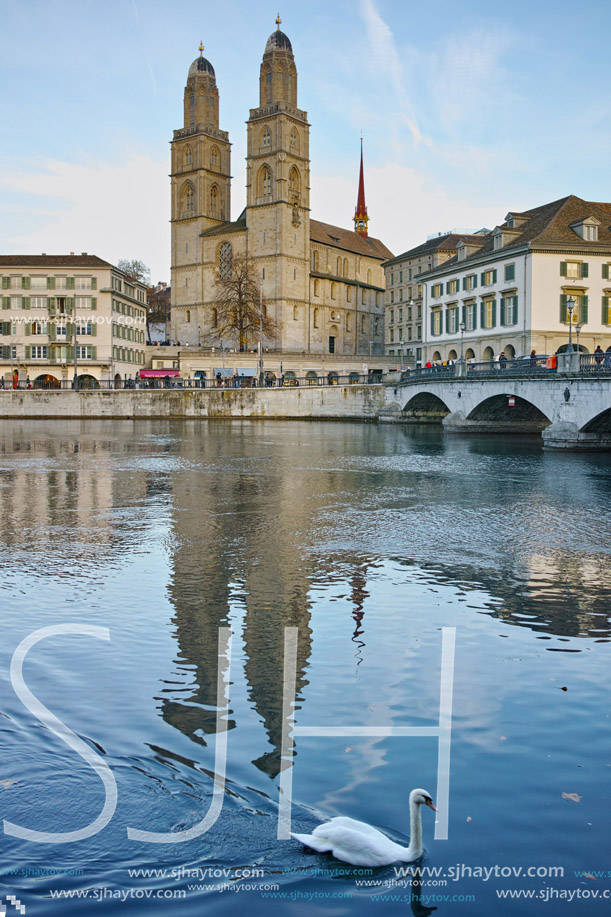 Church of Grossmunster and reflection in Limmat River, Zurich, Switzerland