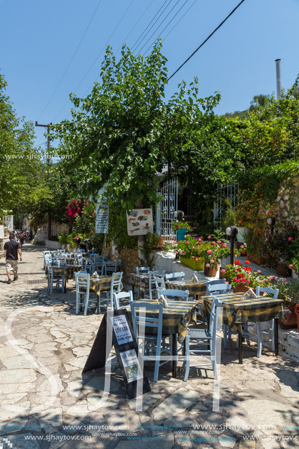 AGIOS NIKITAS, LEFKADA, GREECE JULY 16, 2014: Traditional houses in village of Agios Nikitas, Lefkada, Ionian Islands, Greece