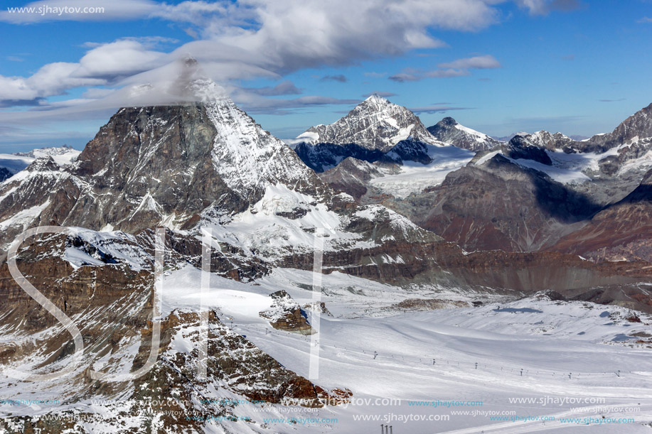 Winter panorama of mount Matterhorn covered with clouds, Canton of Valais, Alps, Switzerland