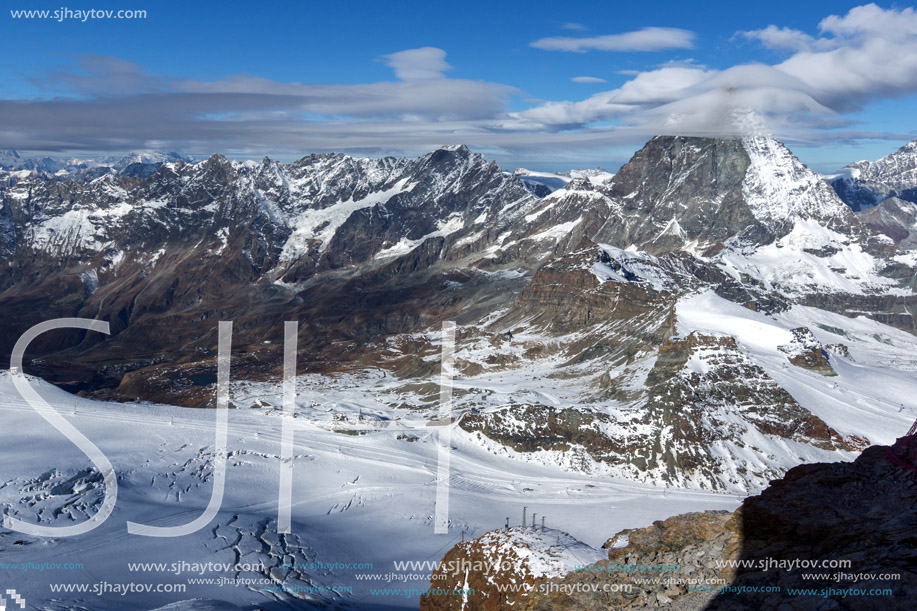 Winter panorama of mount Matterhorn covered with clouds, Canton of Valais, Alps, Switzerland