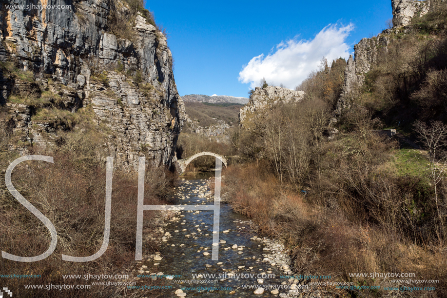 Amazing landscape of Bridge of Kontodimos or Lazaridis in Vikos gorge and Pindus Mountains, Zagori, Epirus, Greece
