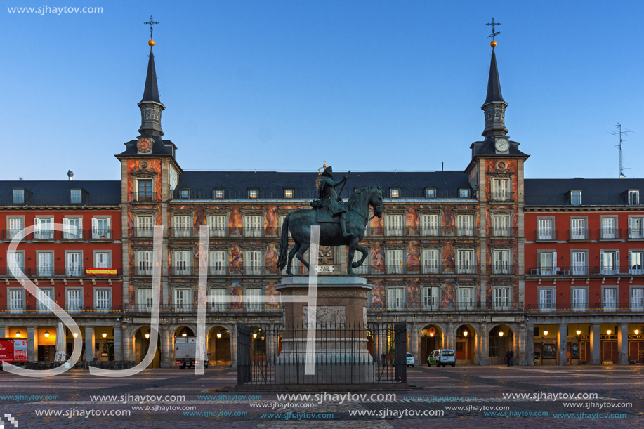 MADRID, SPAIN - JANUARY 22, 2018:  Sunrise view of Plaza Mayor with statue of King Philips III in Madrid, Spain
