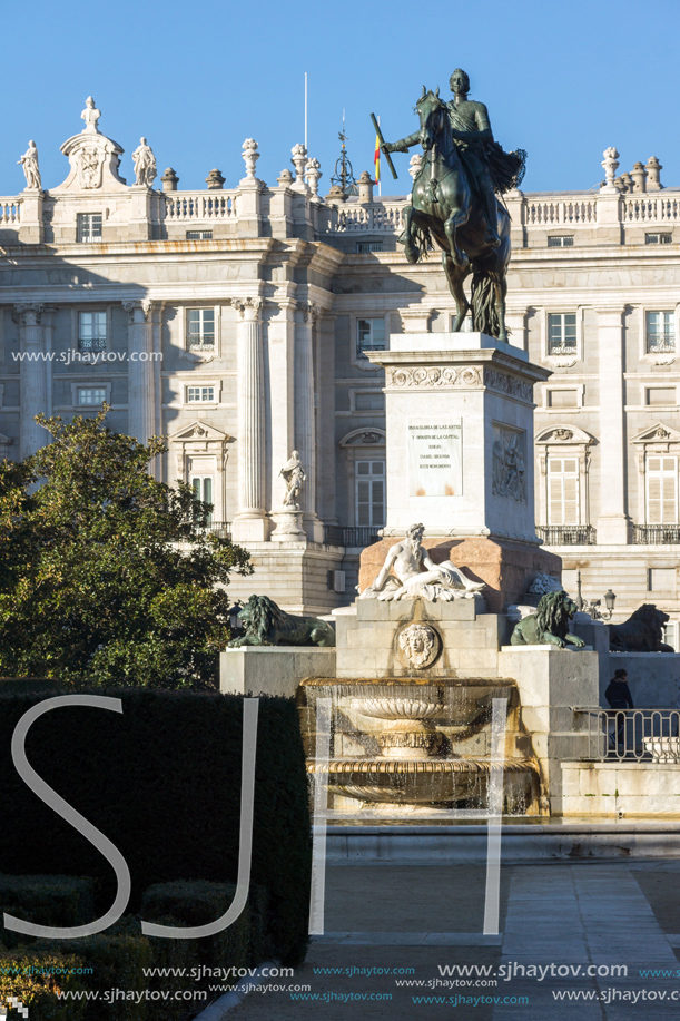 MADRID, SPAIN - JANUARY 22, 2018:  Beautiful view of Monument to Felipe IV and the Royal Palace of Madrid, Spain