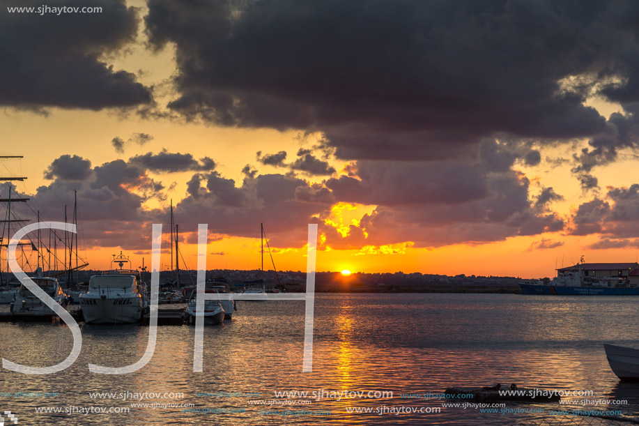 SOZOPOL, BULGARIA - JULY 12, 2016: Sunset at the port of Sozopol, Burgas Region, Bulgaria