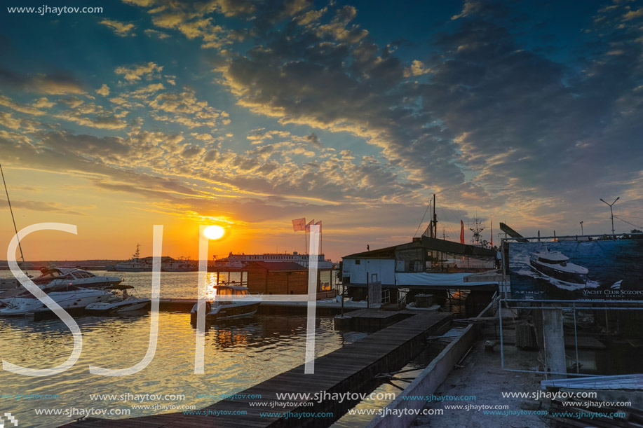 SOZOPOL, BULGARIA - JUNE 26, 2015: Sunset at the port of Sozopol, Burgas Region, Bulgaria