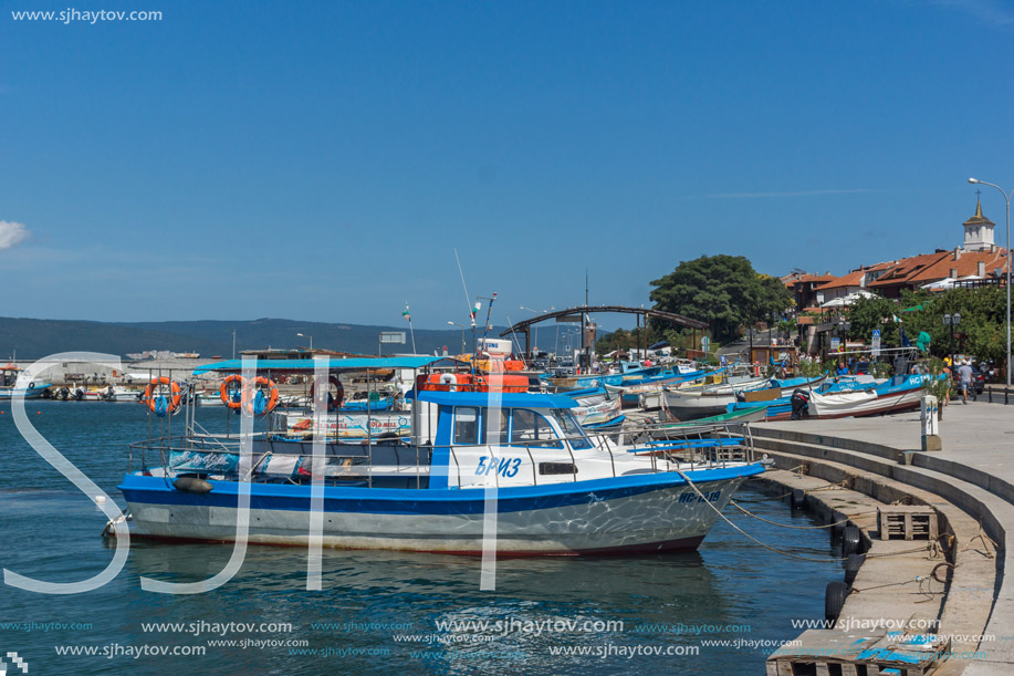 NESSEBAR, BULGARIA - AUGUST 12, 2018: Panorama with fishing boat at The Port of Nessebar, Burgas Region, Bulgaria
