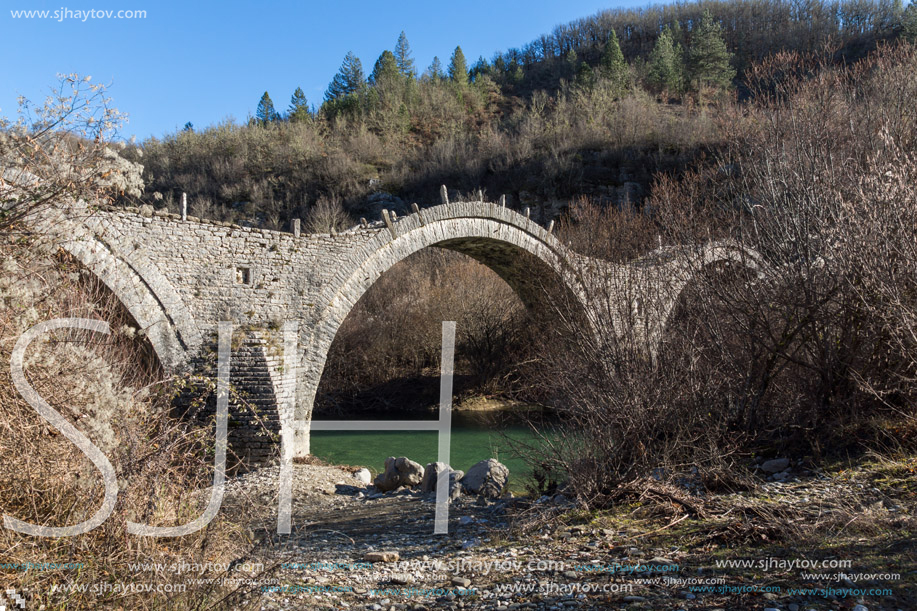 Landscape of Ancient Bridge of Missios in Vikos gorge and Pindus Mountains, Zagori, Epirus, Greece