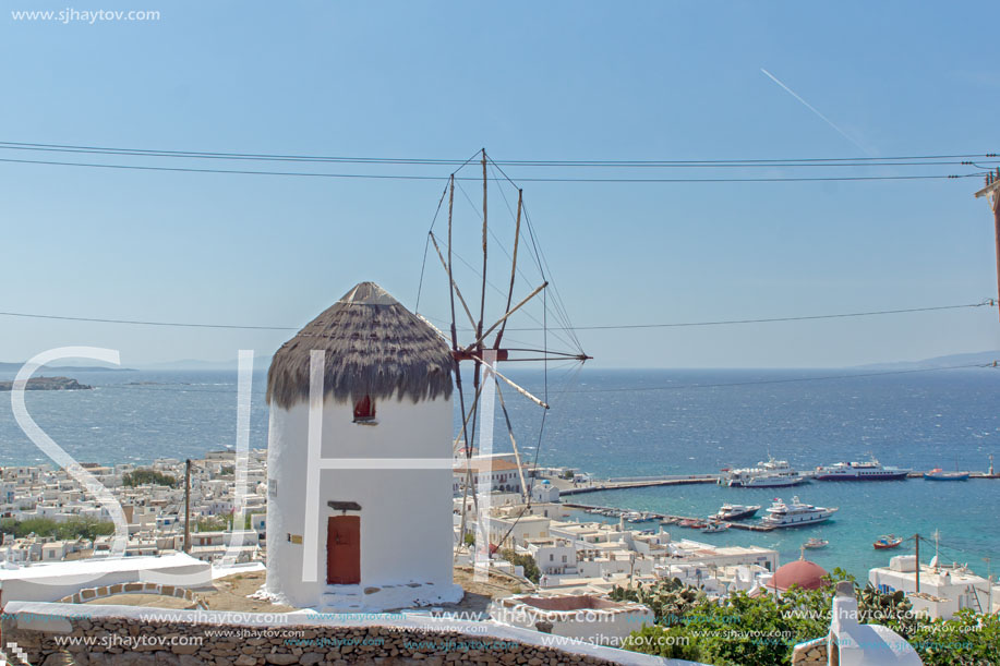 White windmill and Mykonos town, the island of Mykonos, Cyclades