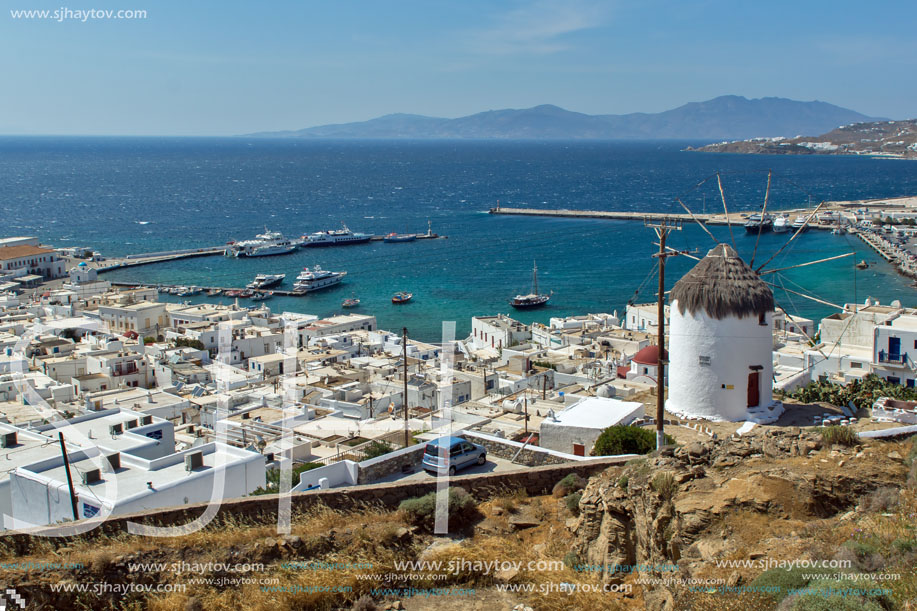 White windmill and Mykonos town, the island of Mykonos, Cyclades