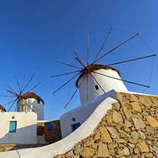 Sunset at White windmill on the island of Mykonos, Cyclades