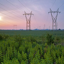 Sunset over High-voltage power lines in the land around Plovdiv, Bulgaria