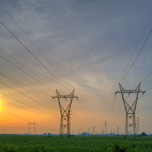 Sunset over High-voltage power lines in the land around Plovdiv, Bulgaria