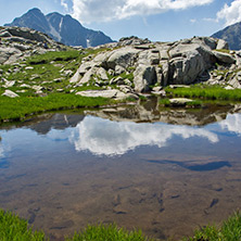 Amazing panorama of the Yalovarnika and The Tooth peaks in Pirin Mountain, Bulgaria