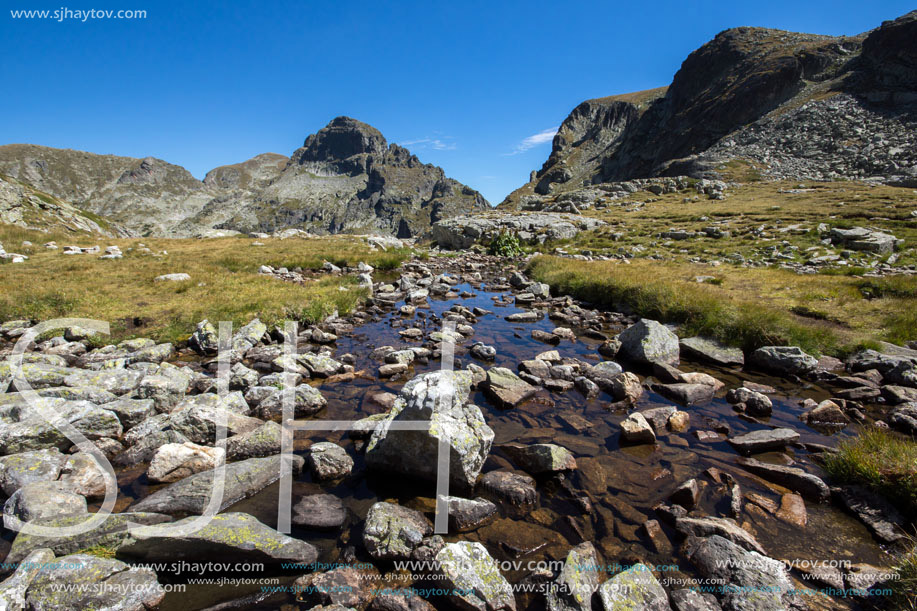 Mountain river and Orlovets peak, Rila Mountain, Bulgaria