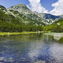 Reflection of Muratov peak in Mountain river, Pirin Mountain, Bulgaria