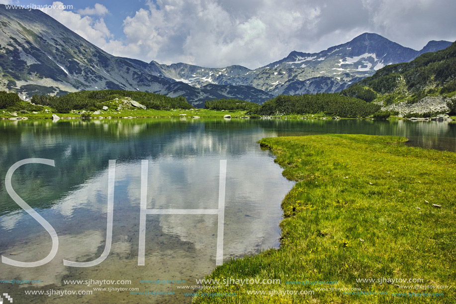 Reflection of Banderishki chukar peak in Muratovo lake, Pirin Mountain, Bulgaria