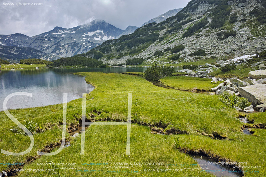 Reflection of Banderishki chukar peak in Muratovo lake, Pirin Mountain, Bulgaria