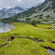 Reflection of Banderishki chukar peak in Muratovo lake, Pirin Mountain, Bulgaria