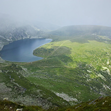 The Kidney lake in clouds, The Seven Rila Lakes, Bulgaria