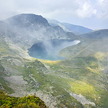 The Eye lake  in clouds, The Seven Rila Lakes, Bulgaria