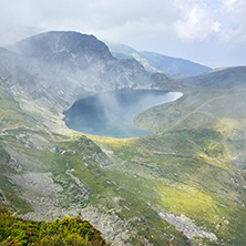 The Eye lake  in clouds, The Seven Rila Lakes, Bulgaria