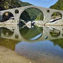 Reflection of Devil Bridge in Arda river, Kardzhali Region, Bulgaria