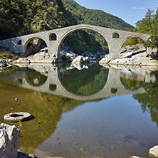 Reflection of Devil Bridge in Arda river, Kardzhali Region, Bulgaria