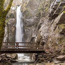 The beautiful Kameshnishki Waterfall in deep forest, Belasitsa Mountain, Bulgaria