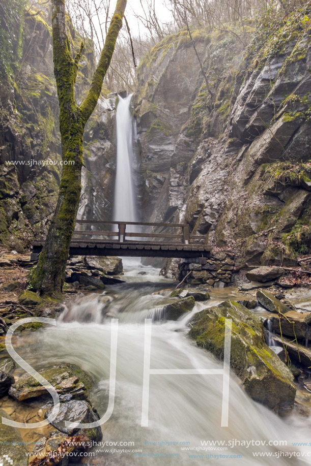 Amazing view of  Kameshnishki Waterfall in deep forest, Belasitsa Mountain, Bulgaria