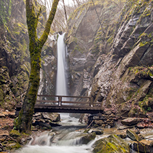 Amazing view of  Kameshnishki Waterfall in deep forest, Belasitsa Mountain, Bulgaria