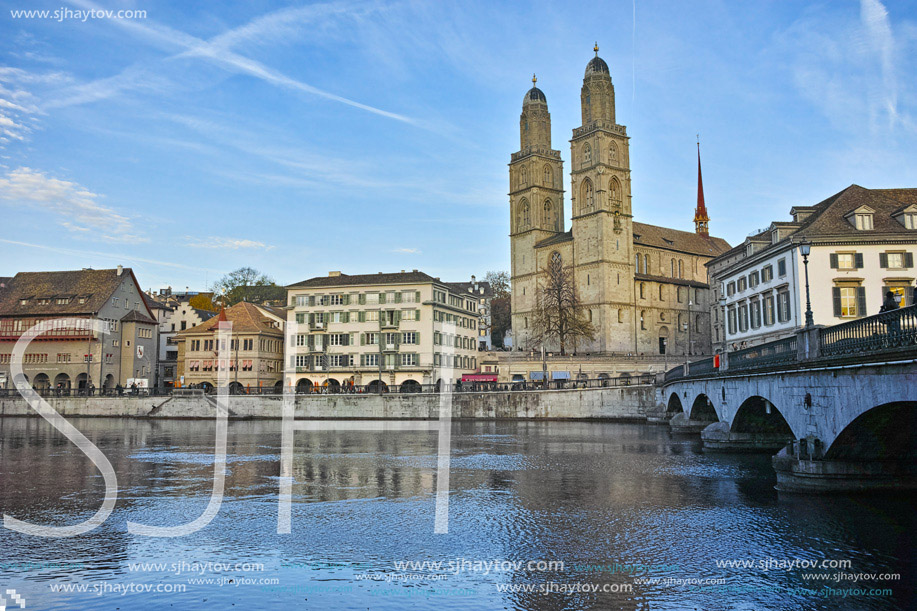 Church of Grossmunster and reflection in Limmat River, Zurich, Switzerland