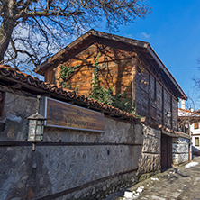 Street in old town and wooden house in Bansko,  Blagoevgrad region, Bulgaria