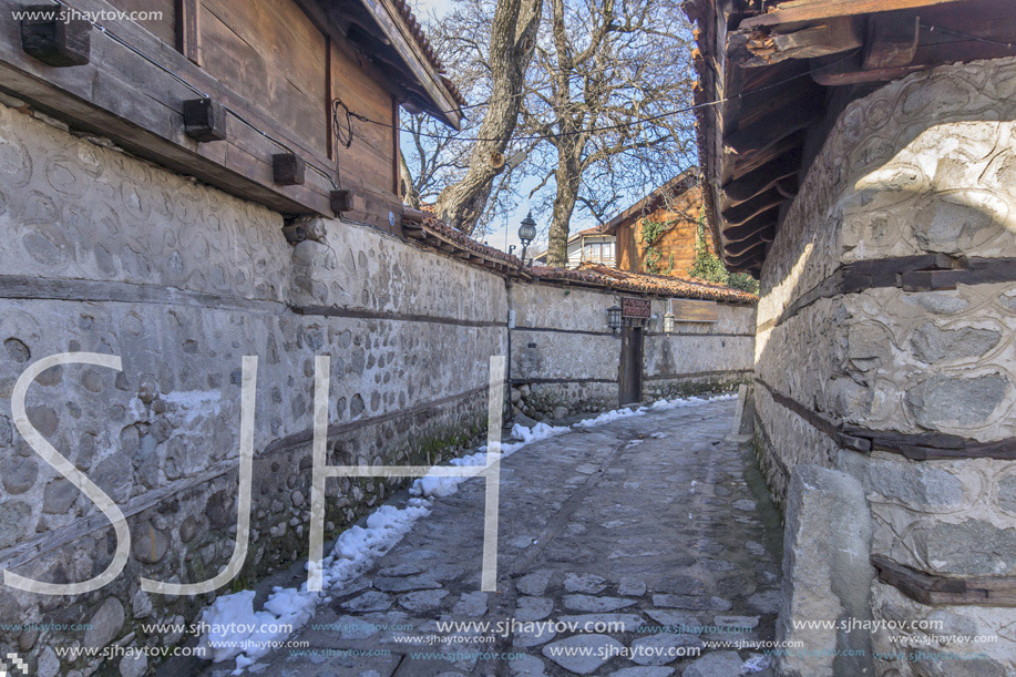 Street in old town and wooden house in Bansko,  Blagoevgrad region, Bulgaria