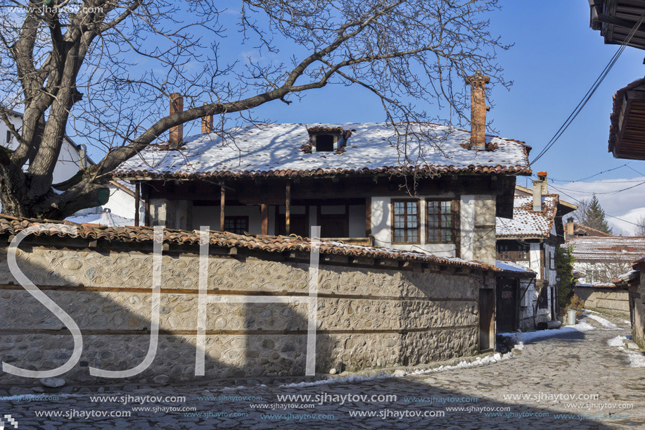 Street in old town and wooden house in Bansko,  Blagoevgrad region, Bulgaria