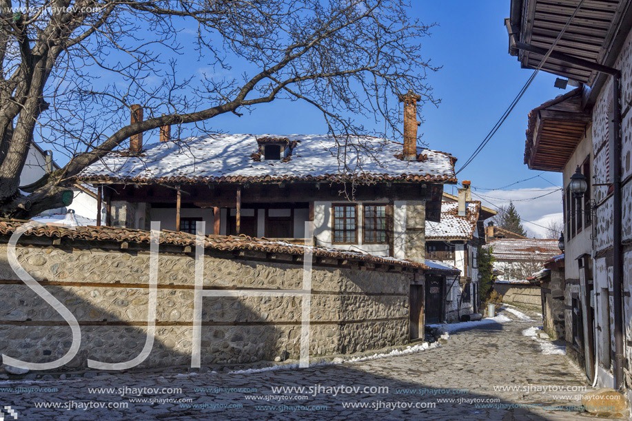 Street in old town and wooden house in Bansko,  Blagoevgrad region, Bulgaria
