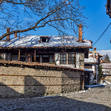 Street in old town and wooden house in Bansko,  Blagoevgrad region, Bulgaria