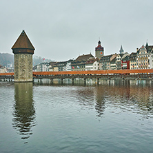 foggy morning and Chapel Bridge over Reuss River, Lucerne, Switzerland