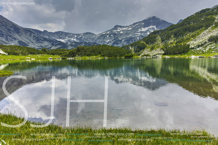 Reflection of Banderishki Chukar Peak in Muratovo lake, Pirin Mountain, Bulgaria