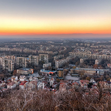 Panoramic Sunset view of city of Plovdiv from Dzhendem tepe hill, Bulgaria