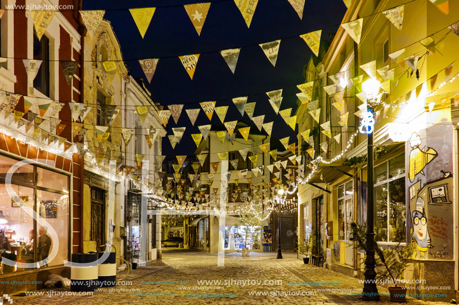 Night photo of Cobblestone street  in district Kapana, city of Plovdiv, Bulgaria