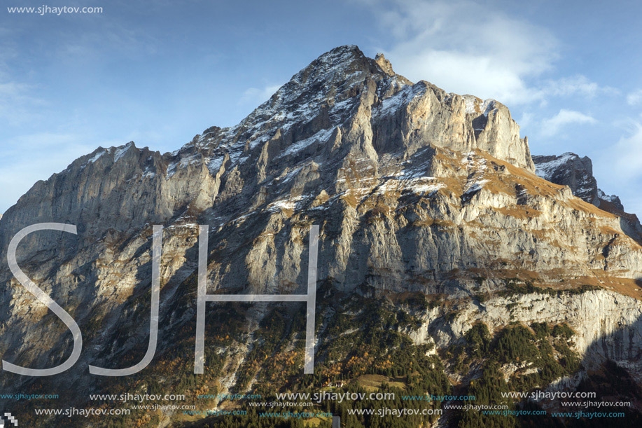 Village of Grindelwald and mount Wetterhornin Alps near town of Interlaken, Switzerland