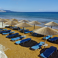 Thatched umbrellas on the xsi beach, Kefalonia, Ionian Islands, Greece