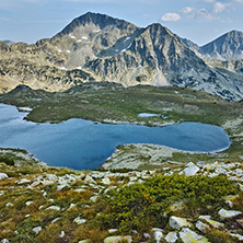 Amazing panorama of Tevno Lake and Kamenitsa and The Tooth peak, Pirin mountain, Bulgaria
