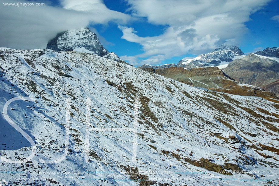 Panoramic view of mount Matterhorn covered with clouds, Alps, Switzerland