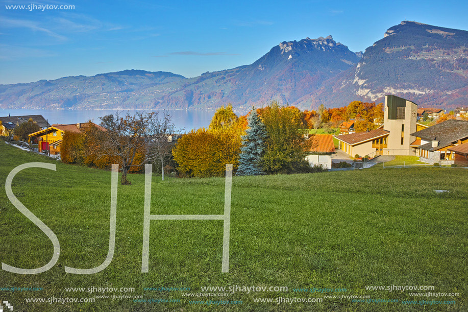 Amazing panorama of Lake Thun and typical Switzerland village near town of Interlaken, canton of Bern