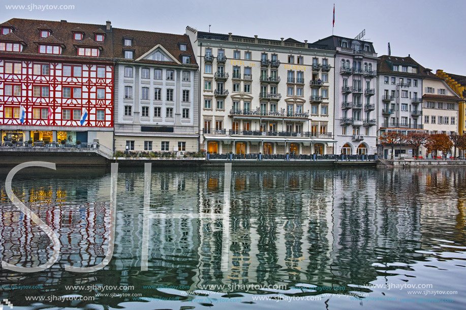 Amazing reflection of old town in The Reuss River, City of Luzern, Switzerland